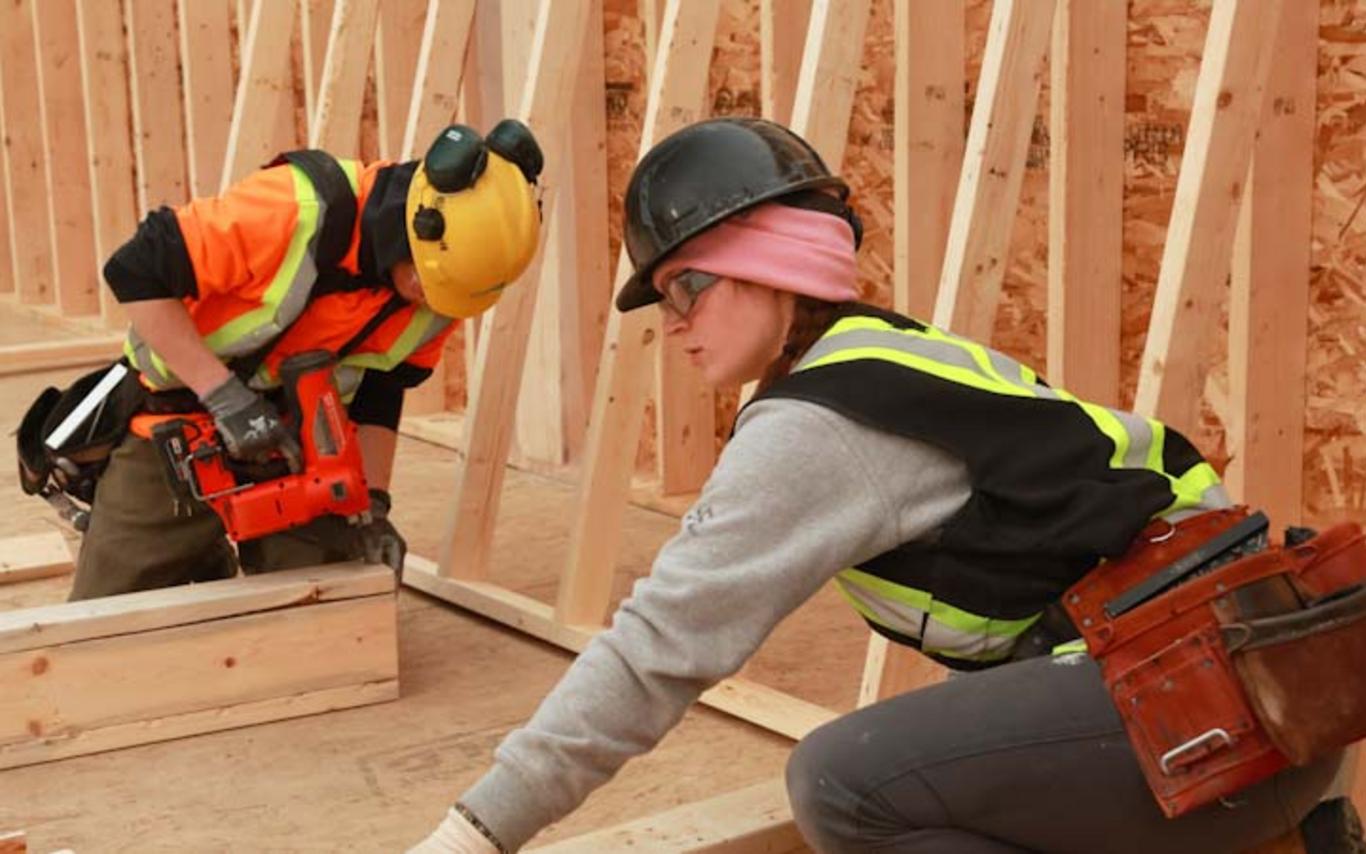 VIU carpentry students framing a new building